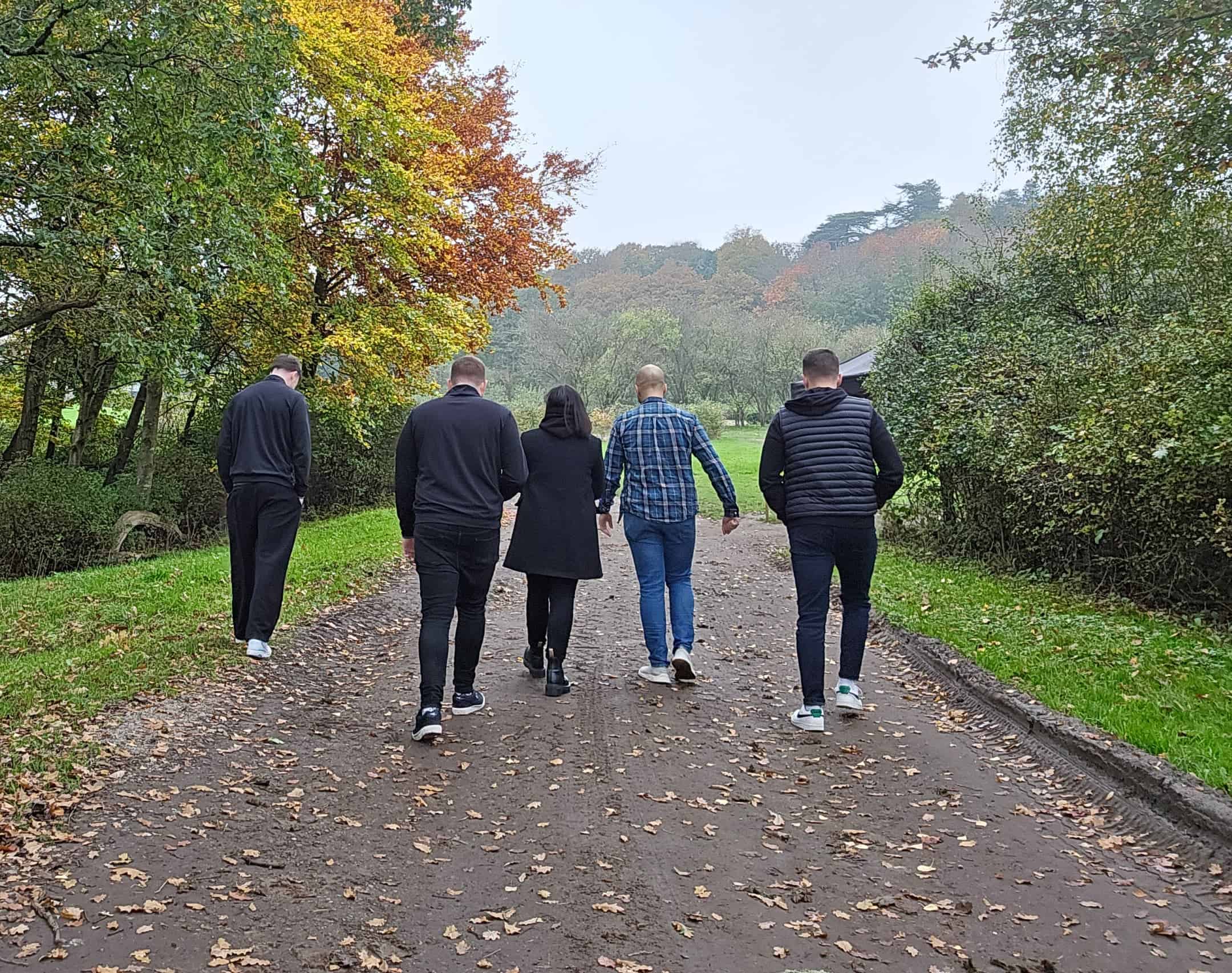 The e-innovate team walking down a country path