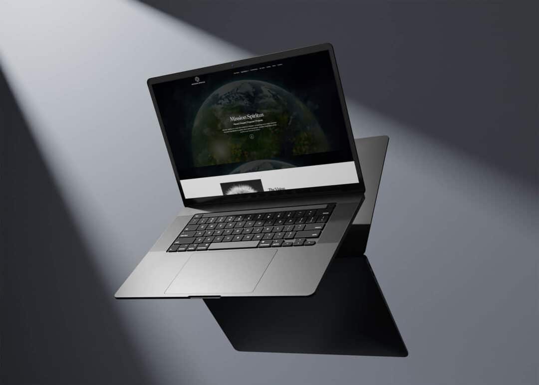 The Mission Spiritus homepage displayed on a laptop