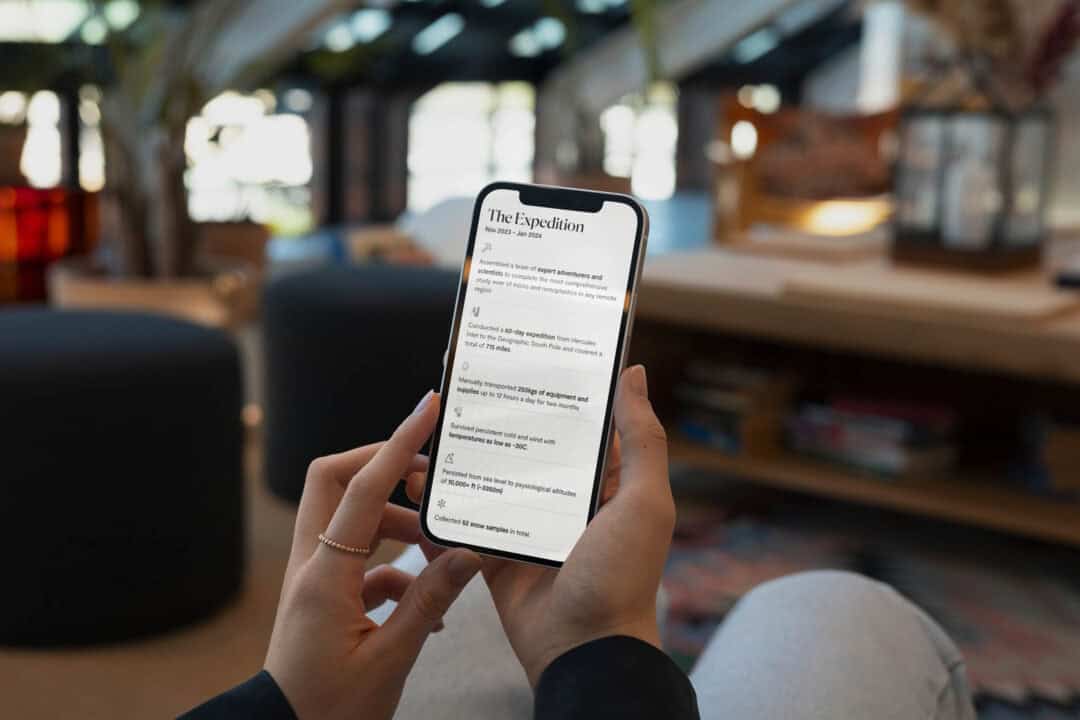 A smartphone user browsing a page on the Mission Spiritus website