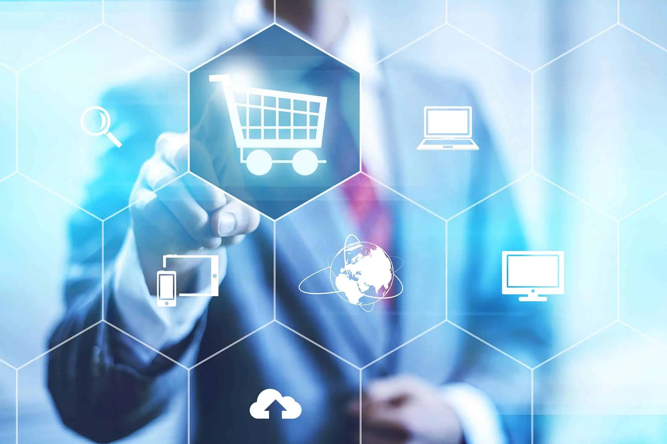 A man in a suit pressing a virtual shopping cart button