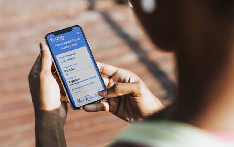 A smartphone user viewing the Young Car Driver car finance calculator